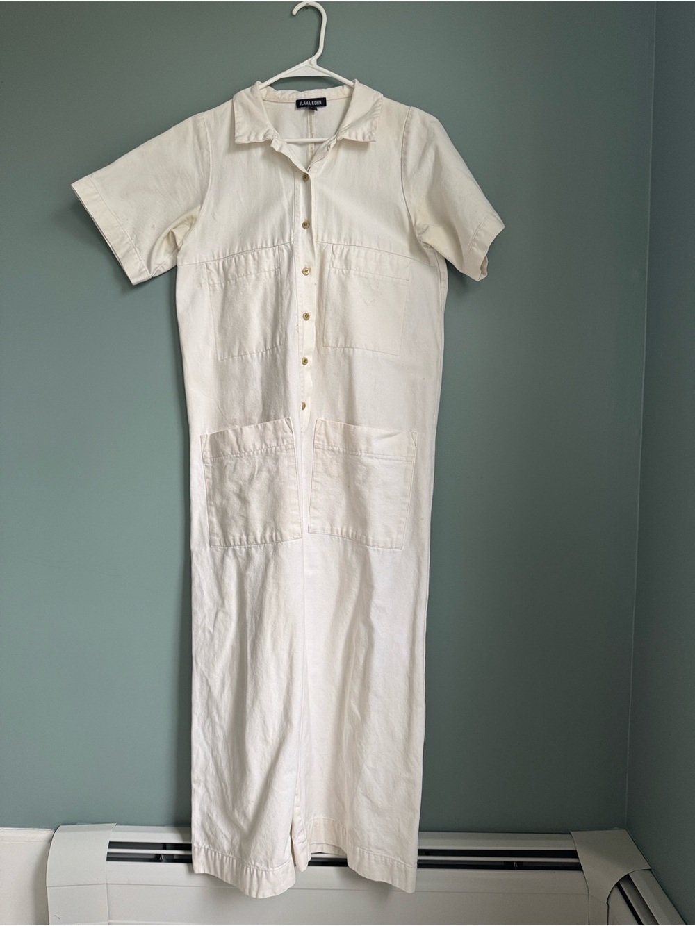 Ilana Kohn ivory utility jumpsuit.